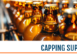 A blog banner image of bottles in a bottle filling production with the logo of FBN and the title "capping support" displayed.